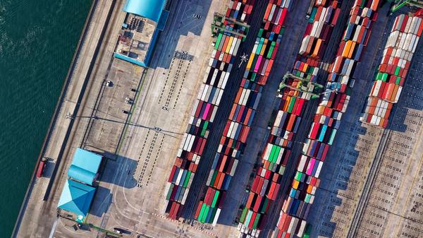 Aerial view of shipping containers at a port terminal